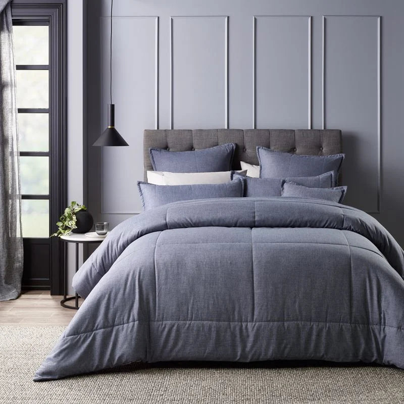 Elevate the sophistication of your bedroom with the Maynard Blue Comforter Set. This exquisite 6-piece ensemble is designed to add a touch of class to your sanctuary.