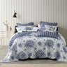 A stunning French Provincial inspired bedspread that features a scalloped edge. Traditional blue hues contrast beautifully on a white background. The bedspreads coordinate stripe printed reverse, also features on the european pillowcases and cushion.
