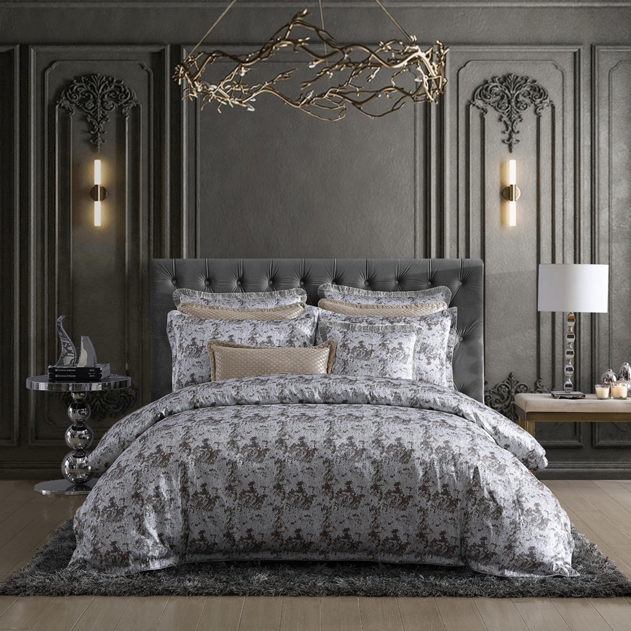 The Davinci Trieste Silver Bed Quilt Cover Set epitomizes modern luxury. Its jacquard weave seamlessly integrates metallic threads, creating a radiant shimmer and understated allure. The quilt cover and pillowcases are skillfully crafted with self-flanged edges, accentuated by cord piping, showcasing elegant tailoring.