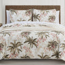 Transform your bedroom with the Bonny Cove Coverlet Set Coconut. Boasting a sophisticated floral design complemented by a beige palm print, this set from Tommy Bahama will take you to a tropical island paradise.