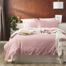 Create an effortlessly cool and inviting bedroom with the Rose Reversible Quilt Cover Set. Crafted from 100% cotton, this set from our Essentials Range offers a perfect blend of breathability and warmth, making it suitable for year-round use. The garment-dyed and stonewashed fabric gives it an airy, soft, and perfectly worn-in feel that will envelop you in comfort.