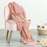 Indulge in the luxurious comfort of the Moss Seed Cotton Throw. Crafted with a supremely soft hand-feel, this throw offers a versatile color and texture that effortlessly enhances any space.