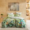 Beautiful jungle foliage and lush tropical flowers of Hibiscus and wild orchids, frame the soft green background watercolour hues. Creating the perfect sanctuary for the parrots and cockatoos to hang out. The contrast reverse print is made from line art depicting tonal hibiscus and orchids.