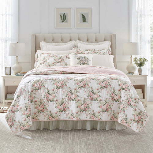 Add a romantic and cozy touch to your bedroom decor with the Joyce Coverlet Set from Laura Ashley.