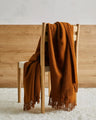 Made from 100% New Zealand lambswool, Nevis throw blankets in spice are simply luxurious. All of our throws make the perfect companion over cooler days and nights, and can also be enjoyed outdoors