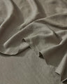 Crafted from the highest quality French Flax Linen. The Caper colourway is a soft, muted green that is ideal for those wanting a subtle pop of colour with a natural and nature inspired feel.