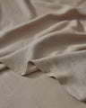 Crafted from the highest quality French Flax Linen. The Shell colourway is a soft, sandy beige that will add a touch of warmth and sheer colour to a bedroom — perfect for any neutral lover.