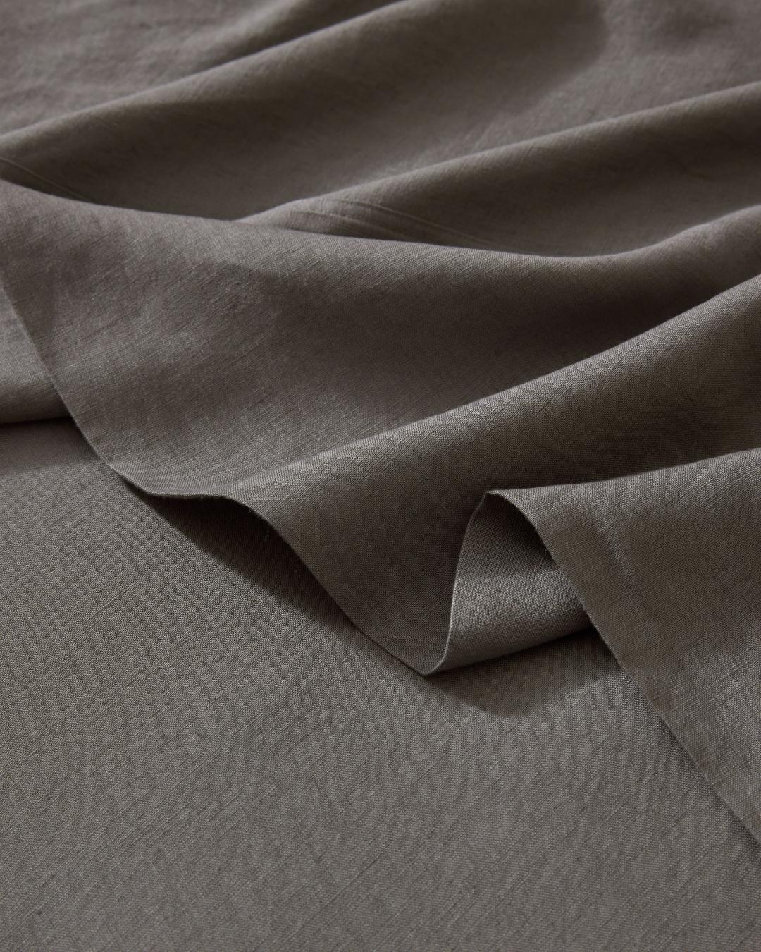 Crafted from the highest quality French Flax Linen. The Charcoal colourway is perfect for those wanting a mid-toned, sophisticated grey to add depth, or match a dark or cool-toned bedroom.