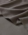 Crafted from the highest quality French Flax Linen. The Charcoal colourway is perfect for those wanting a mid-toned, sophisticated grey to add depth, or match a dark or cool-toned bedroom.
