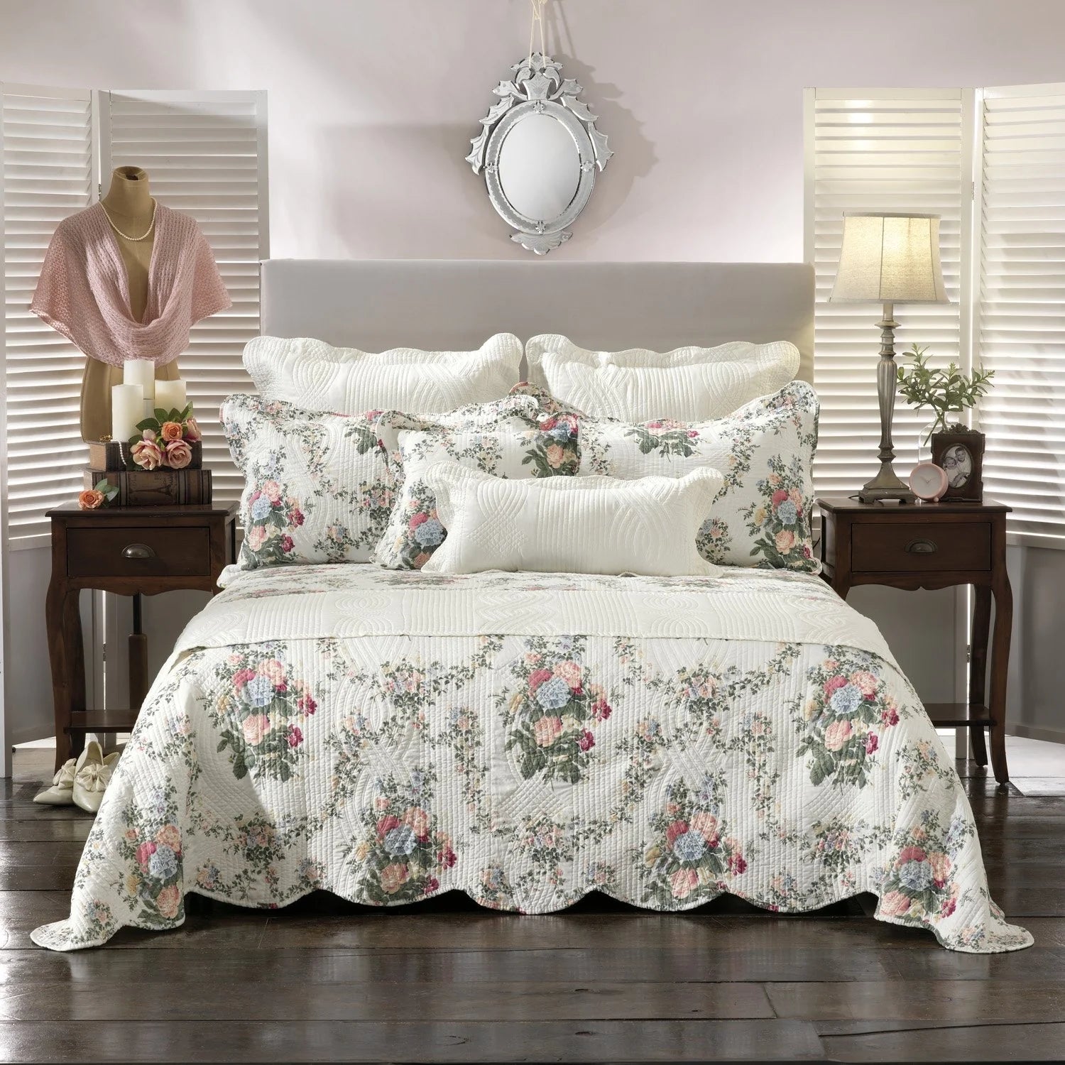 Introduce an air of timeless heritage into your bedroom with our stunning scalloped edge bedspread. Crafted with meticulous attention to detail, this exquisite piece features a classic white background that serves as a canvas for a breath taking array of flowers.