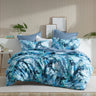 Embrace the modern allure of the Heather Quilt Cover Set Range Blue by Logan and Mason, where layers of foliage in various shades of blue come together to form this captivating design.