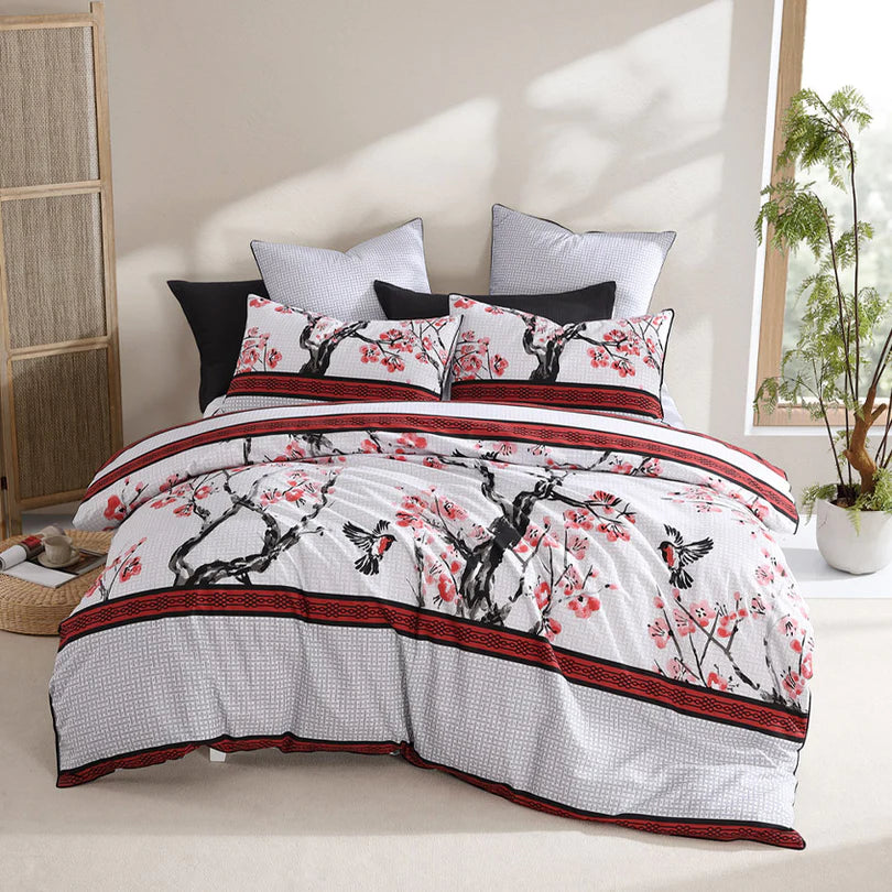 Unleash the elegance of oriental ink brush paintings with the Kyushu Quilt Cover Set Range Red by Logan and Mason. Drawing inspiration from traditional imagery, this exquisite design showcases the vibrant colors of red, black, and silver.