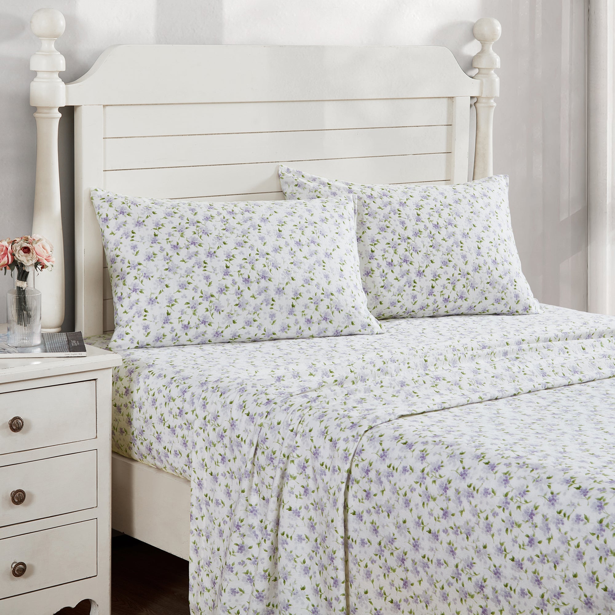 This luxuriously soft Laura Ashley Virginia Cotton Flannelette Sheet Set boasts a beautiful lilac floral design. Expertly crafted from premium cotton, this set promises a comfortable night's sleep with added warmth and style. The perfect choice for a peaceful bedroom oasis.