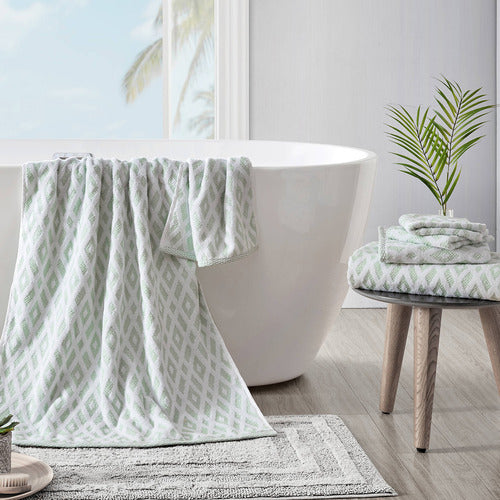 Add a touch of style to your bathroom décor with the Bimini 6 Piece Towel Set from Tommy Bahama. Constructed with durable, long-lasting cotton, these medium-weight towels feature a gorgeous green and white geometric design.