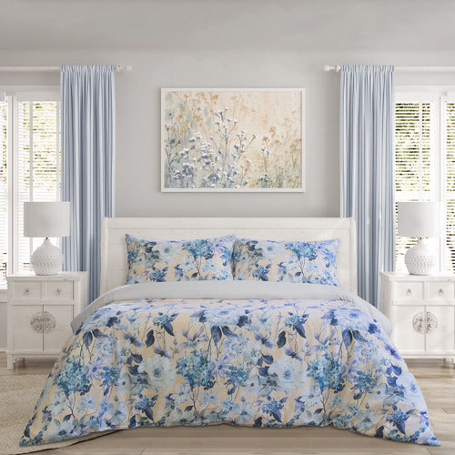 The Peach Blossom Quilt Cover Set Range Multi by Ardor Boudoir gracefully notes soft tones of blue and peach in this trailing floral design, with a plain dyed reverse to compliment general aesthetics.
