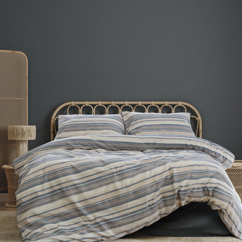 The Charlie Comforter Set Range Multi by Ardor Boudoir is full of both modern and vintage ambience. Weathered striped shades of stormy sea, faded terracotta & oatmeal set a coastal mood for contemporary and classic style.