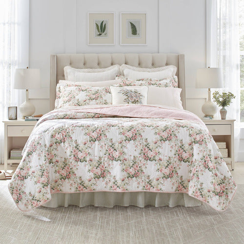 Add a romantic and cozy touch to your bedroom decor with the Joyce Coverlet Set from Laura Ashley. 