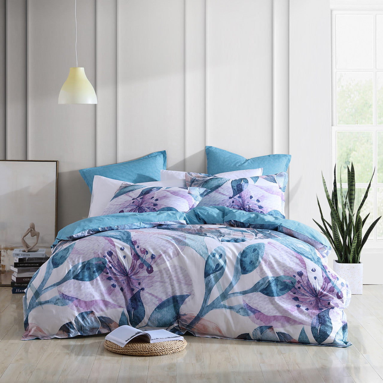 Indulge in the contemporary beauty of the Logan and Mason Teagan Lilac Quilt Cover Set, inspired by blooming flowers and lush foliage