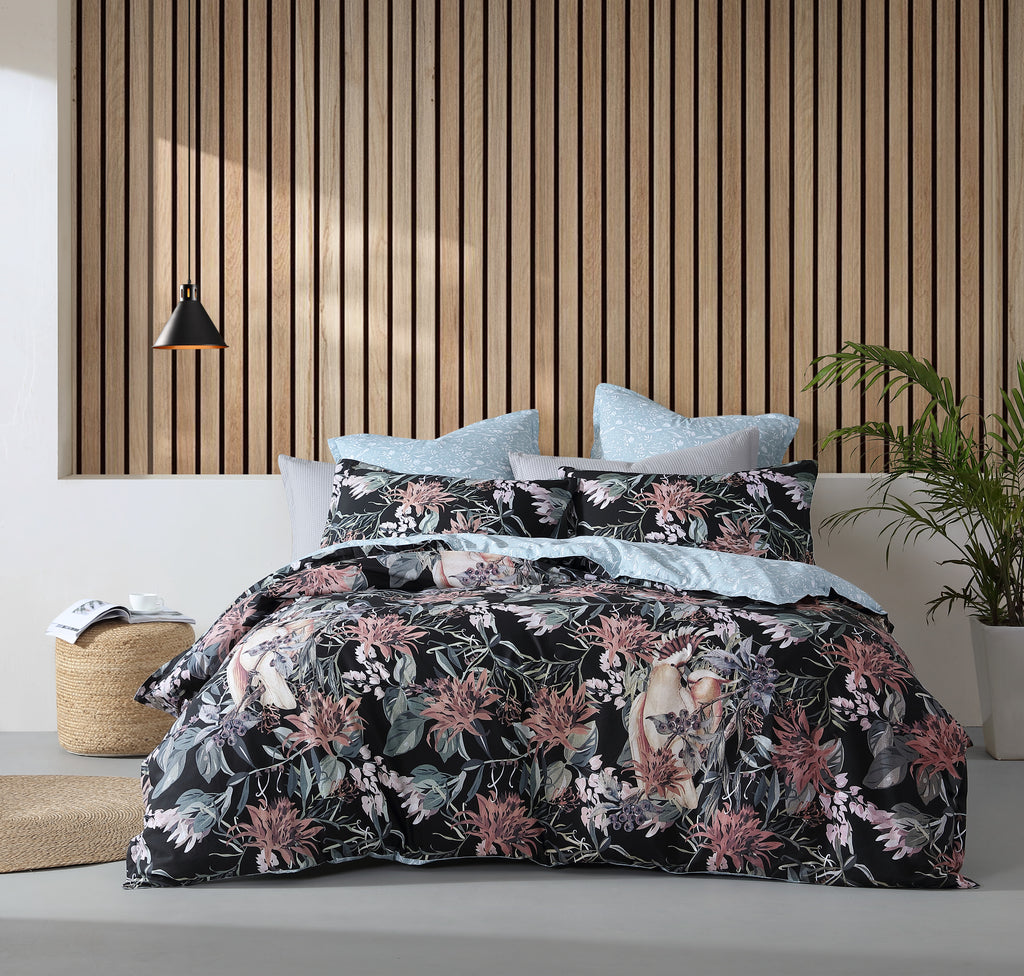 Major Black is an Australiana flora and fauna design. Hidden amongst  trailing wildflowers of desert pinks and lilac and leaves of eucalypt