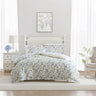 The Meadow Floral Quilt Cover Set Range Sun Blue by Laura Ashley bursts with blue and yellow Spring blooms swaying in the breeze. Made from cotton sateen, the set is silky soft and reverses to a sunny yellow gingham print.