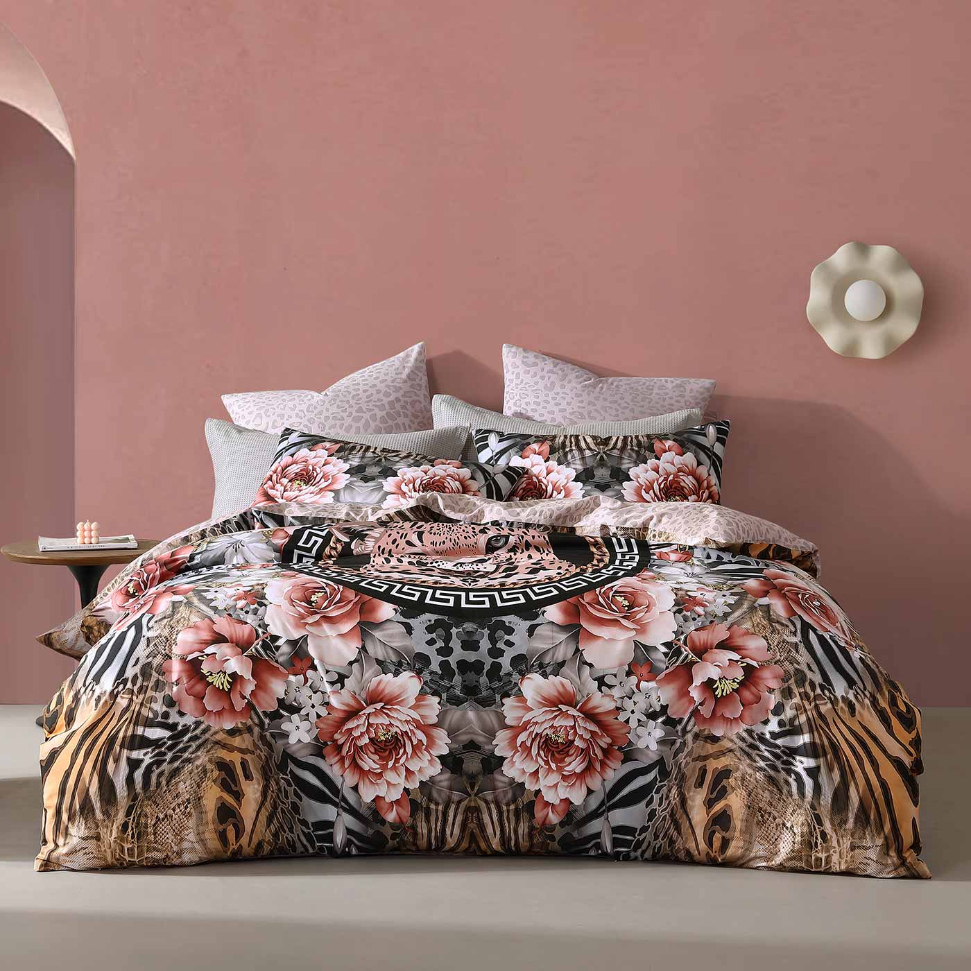 Bring an exotic touch to any bedroom with Nala Leopard, featuring mesmerizing patterns of leopard, tiger, and zebra skin with blush blooms on a backdrop.