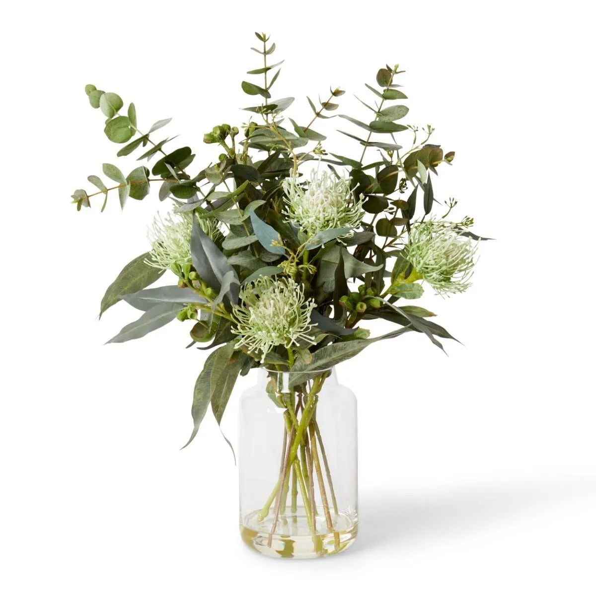 This Pin Cushion Mix Tillie Vase Green is perfect for adding a touch of floral and greenery to any interior. The remarkably realistic design is 57cm tall and requires no watering - providing a convenient and beautiful accent to any space.