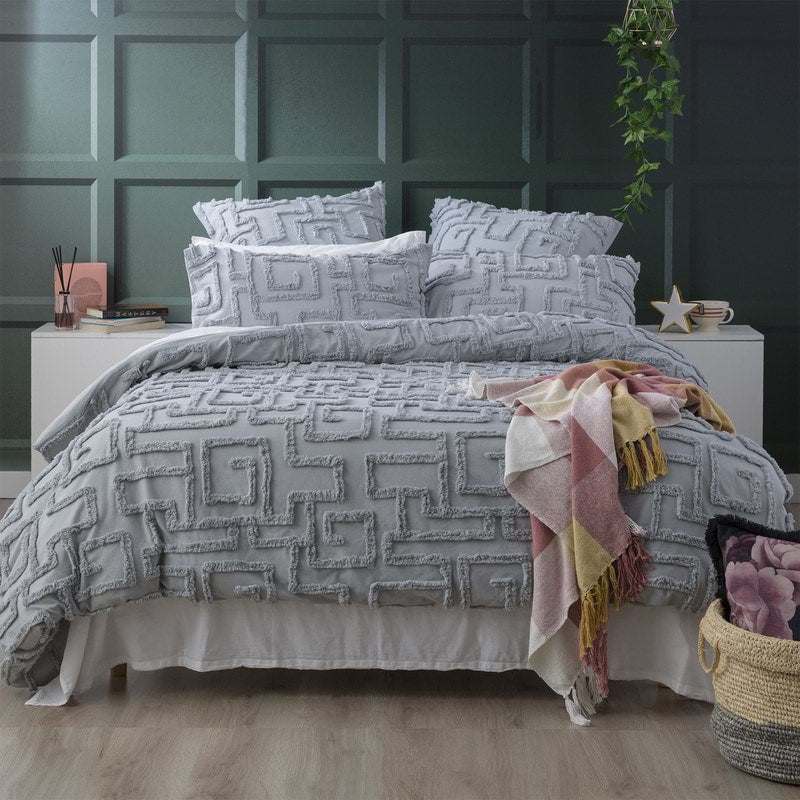 Elevate your bedroom decor with the Riley Cotton Quilt Cover Set. Its intricate tufting pattern adds a touch of sophistication and texture to your bed, creating a stylish and inviting atmosphere. Made from soft cotton, this quilt cover set offers a luxurious feel against your skin, ensuring a comfortable and restful sleep. The set includes a quilt cover and two pillowcases, allowing you to create a coordinated and harmonious look in your bedroom. 