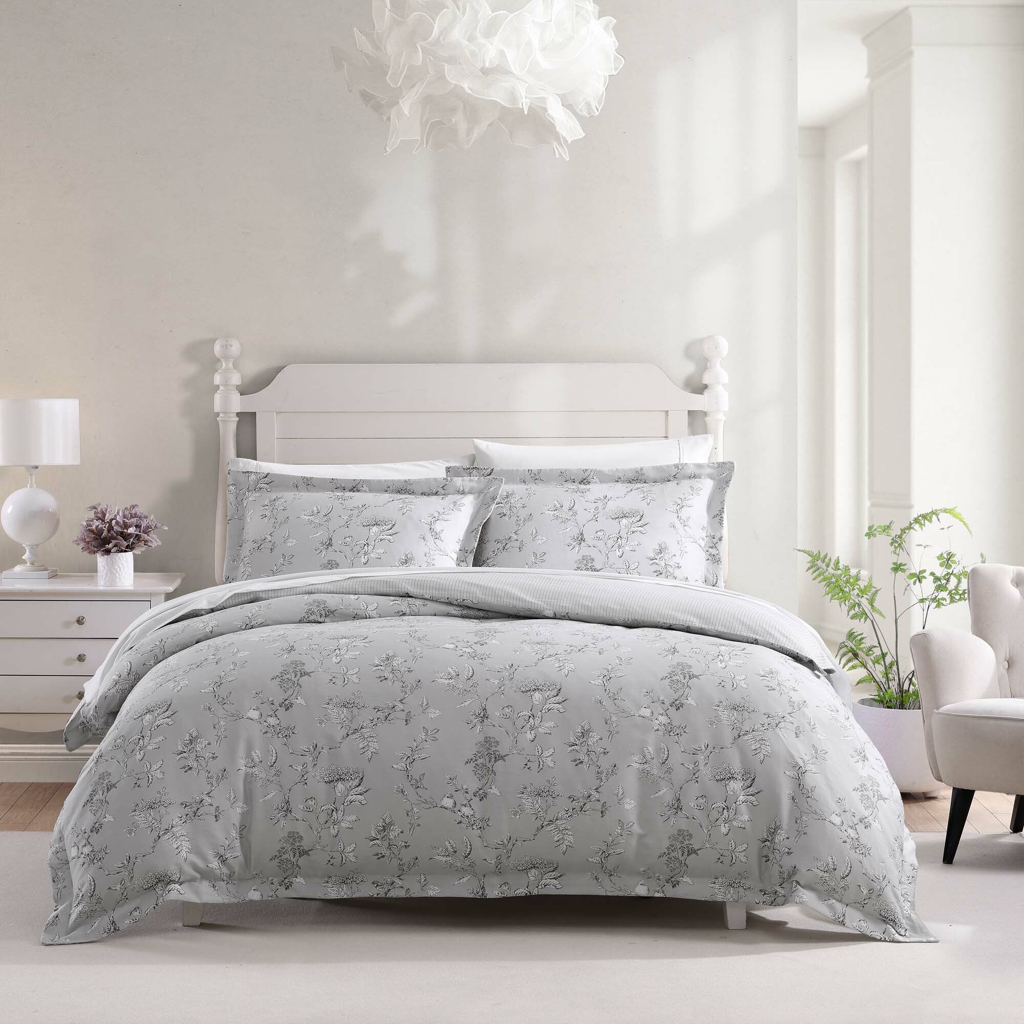 The Elderwood Quilt Cover Set Range Steel by Laura Ashley has a quintessentially English country style with its beautiful soft birds print. The hand drawn line work is intricate and sentimental while boasting a fresh colour palette for the season ahead. Available in a range of colours.