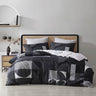 The Taj Black Quilt Cover Set, with its modern take on art deco patterns, adds style and sophistication to your bedroom.