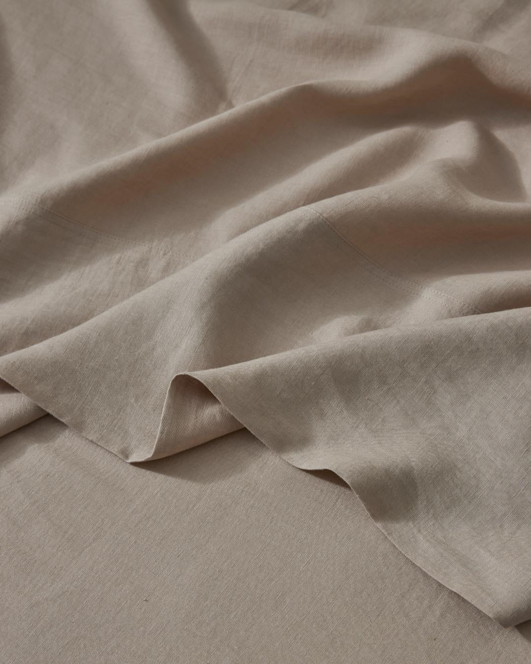 Crafted from the highest quality French Flax Linen. The Shell colourway is a soft, sandy beige that will add a touch of warmth and sheer colour to a bedroom — perfect for any neutral lover.