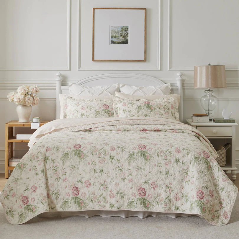 The Breezy Floral Coverlet Set Pink and Green by Laura Ashley is a romantic garden floral design.