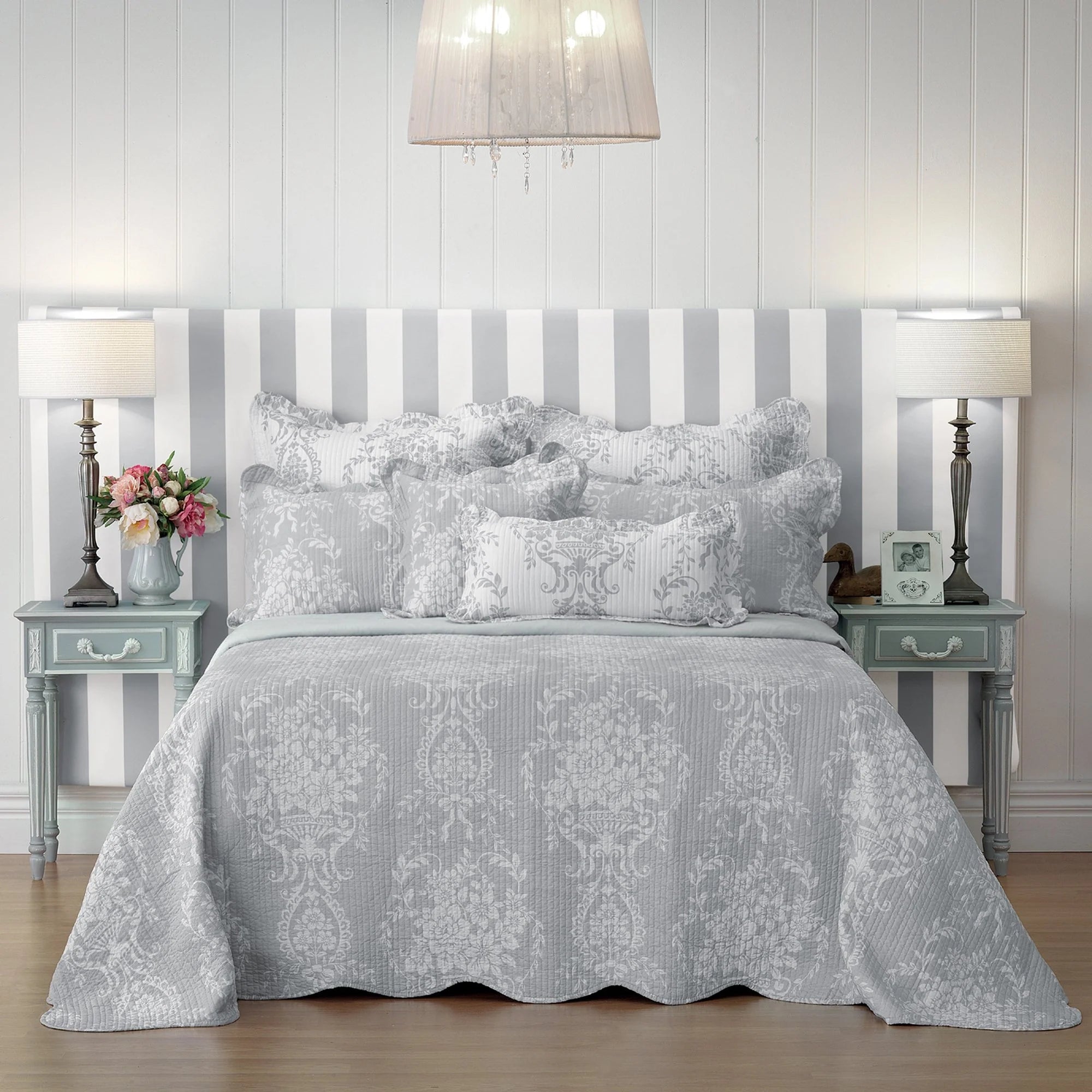 Indulge in the elegance of a French provincial boudoir with this exquisite bedspread. Crafted from luxurious soft textured fabric, it beautifully captures the essence of sophistication