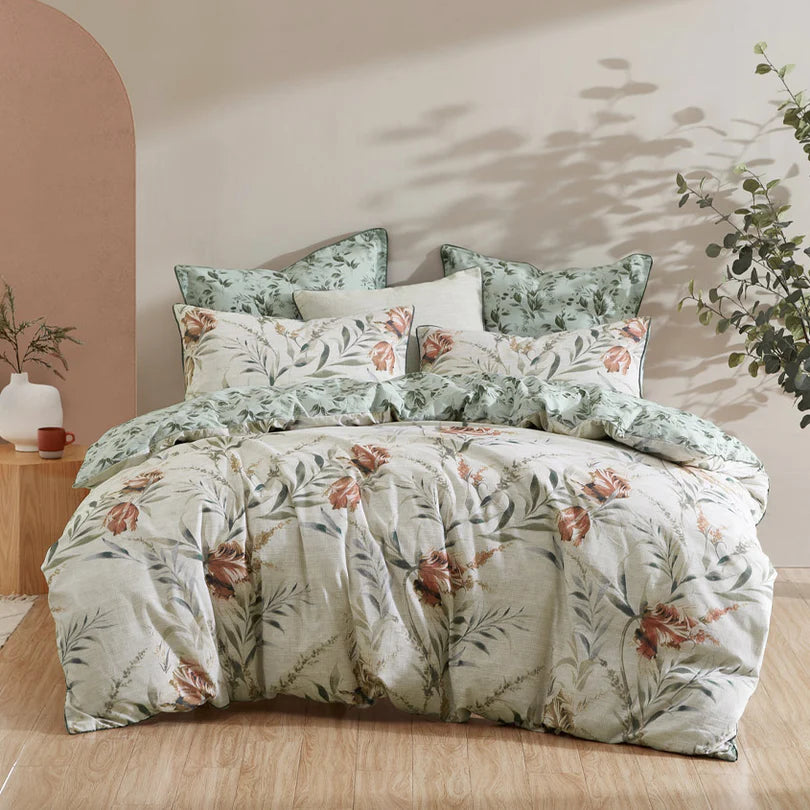 Experience the graceful beauty of Elise Sage, where a stunning collection of watercolor florals gracefully blooming on a printed linen textured background awaits. 