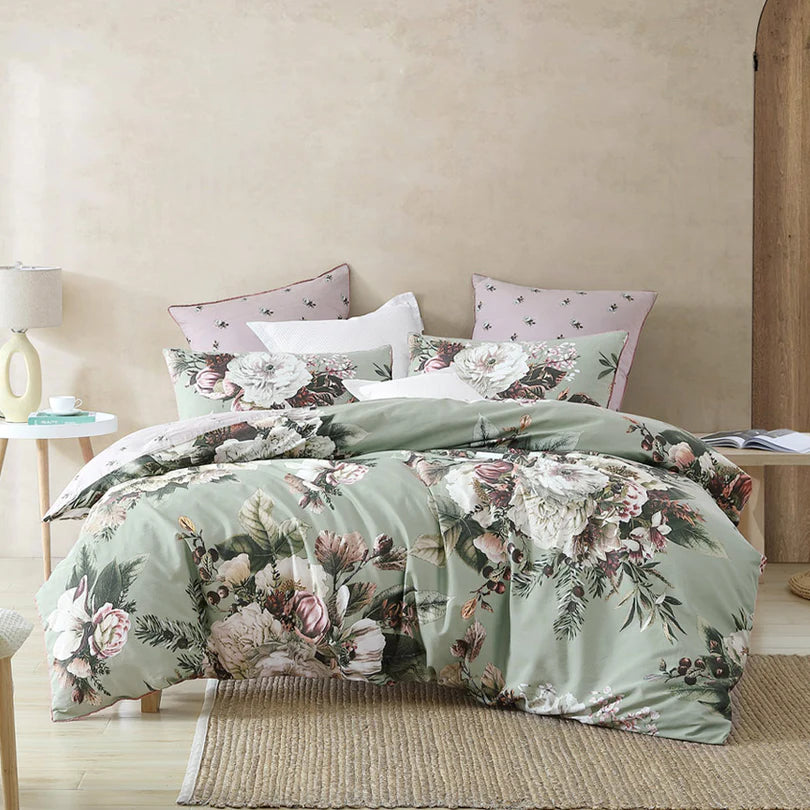 Experience the timeless elegance of the Winter Quilt Cover Set Range Sage by Logan and Mason, featuring a heritage-inspired floral design